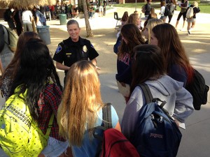 Officer Sherri Mannello offers advice to students on the Coronado High School campus.