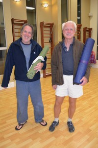 Murray Nies (left) turned to yoga to develop more agility. “But I’ve grown to love the meditation aspect of it, too,” he said, while Sandy Knapp (right) began practicing yoga about nine years ago to stay limber. “It virtually eliminated my back problems,” he said.